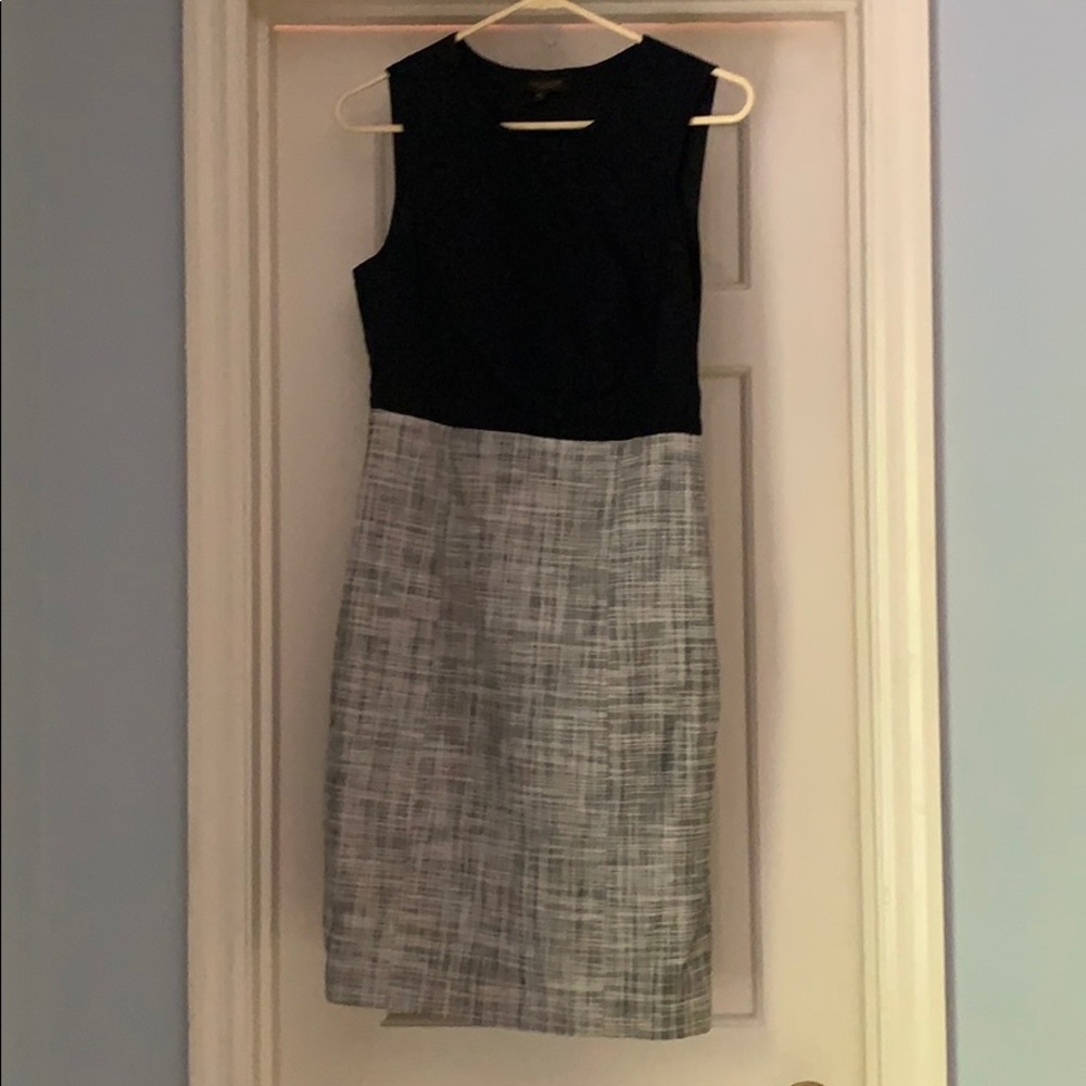 Sleeveless business casual dress.
